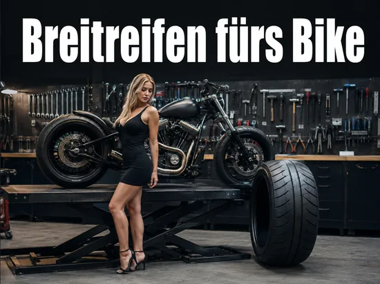 Frau in einer Motorradwerkstatt neben einem sehr breiten Hinterreifen: neuer Breitreifen fuer Custom-Bikes