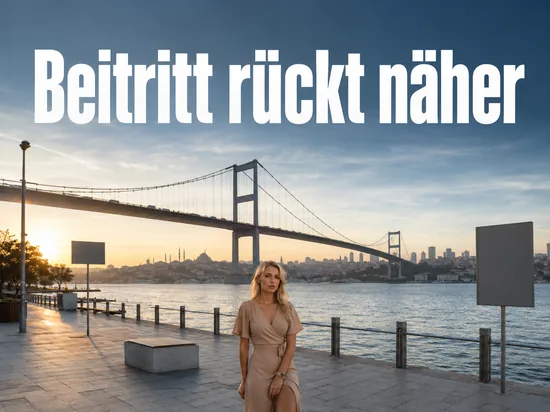 Frau steht auf einer Uferpromenade vor einer Haengebruecke und einer Stadtsilhouette